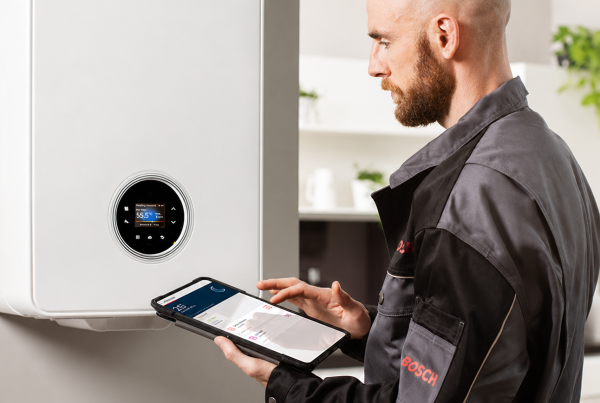 Boiler Repair Engineer Inspecting a Worcester Bosch Boiler